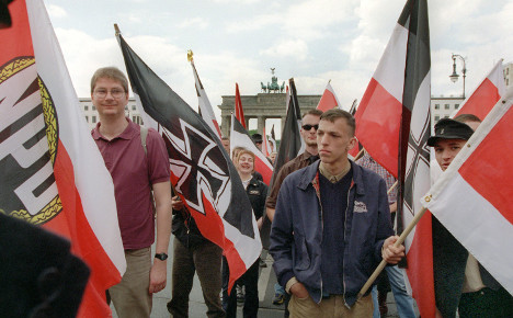 Right-wing protesters with black, white and red. Photo: DPA